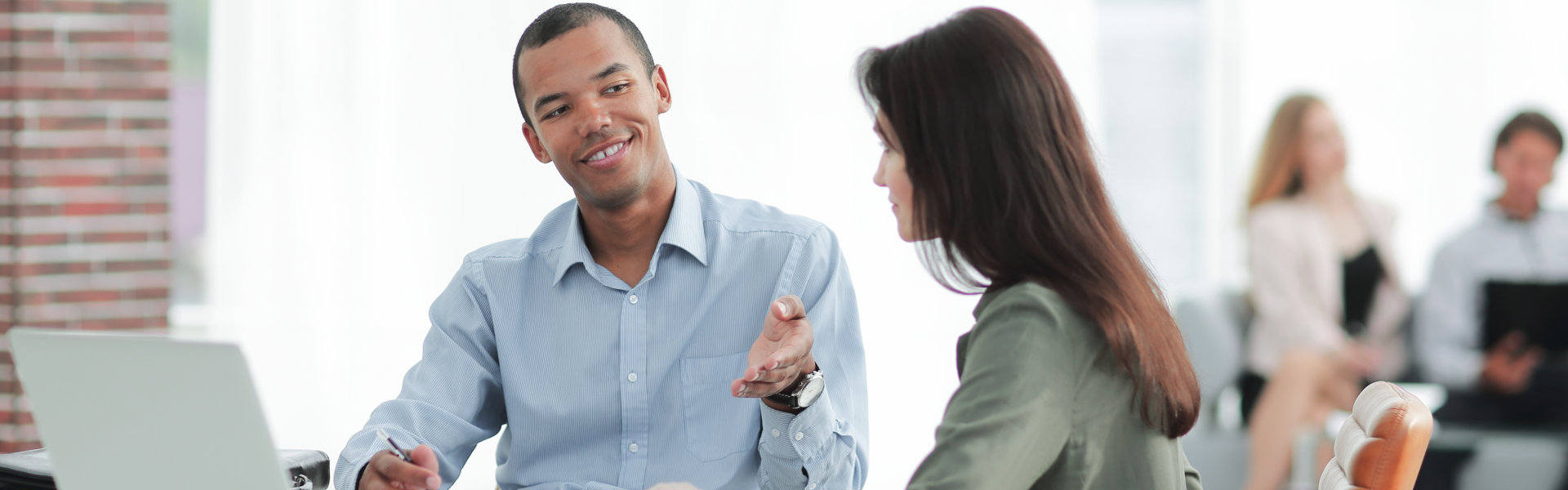 man talking to woman
